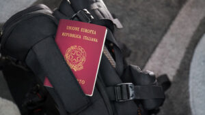 italian passport with travel bag