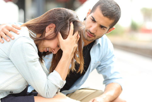 rejected traveler crying near airport